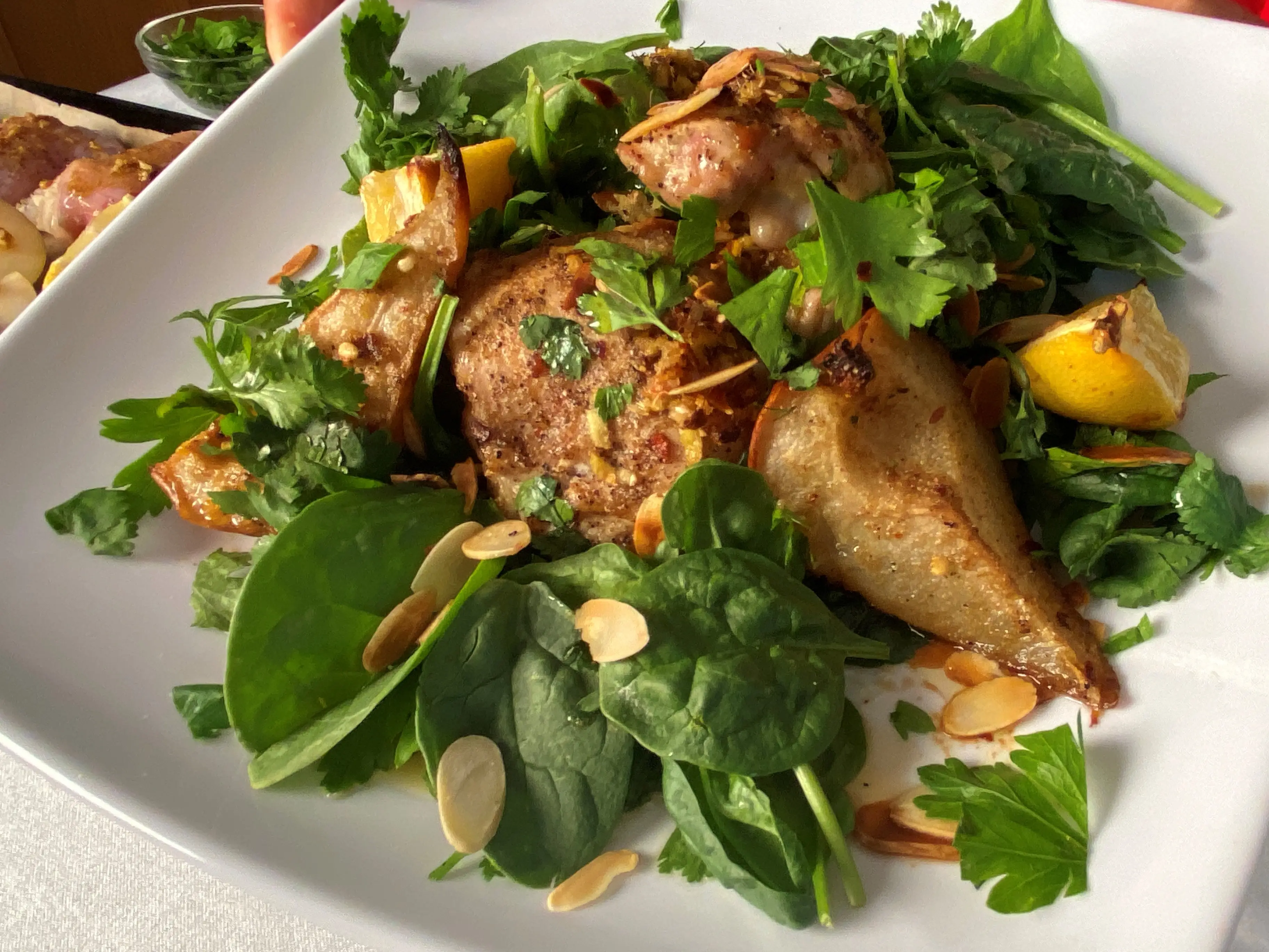 Sheet pan pears and chicken with fresh herbs and caramelized lemon