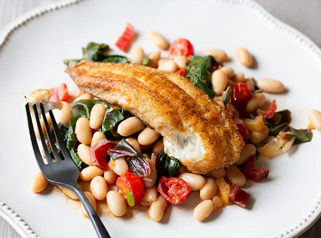 Mediterranean fish & white bean sheet pan bake